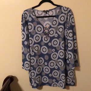 Stylish designer blouse with 3 silver rings.